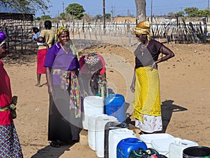 NAMIBIA, Kavango, OCTOBER 15: Women in the village waiting for water. Kavango was the region with the Highest poverty lev