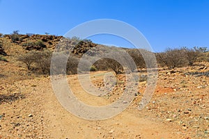 Namibian landscape along the gravel road. Oanob, Namibia