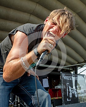 NAMPA, IDAHO - SEPTEMBER 25: Rob Ulrich on vocals screams into the mic at the Rockstar Uproar Festival on September 25 2012 in Nam