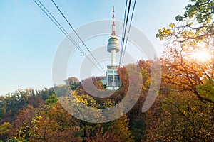 Namsan N Seoul Tower with the line of cable car at the sunset ti