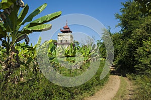 Nan Myint Watch Tower, is the only surviving structure of King Bagyidaw`s royal palace at Inwa Ava in Myanmar. Rural road