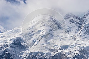 Nanga Parbat mountain peak in cloudy day, Fairy Meadow, Pakistan