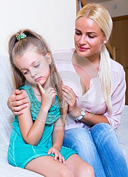 Nanny calming a fretful child