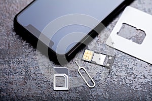 Nano Sim Card In The Card Adapter With Eject Pin