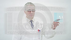 NANOSCIENCE text on a modern touchscreen display and a male scientist wearing white lab coat