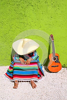 Nap lazy typical mexican sombrero man sitting