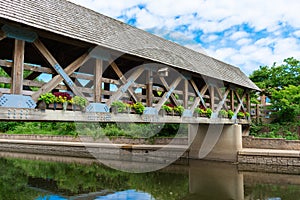 Naperville Riverwalk Covered Bridge over the DuPage River photo
