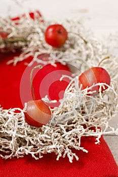 Napkin christmas decoration in wreath shape decorated with tiny