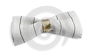 Napkin with decorative ring for table setting isolated on white