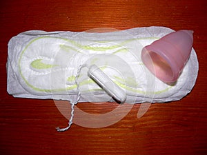 Napkin, tampon and menstrual cup