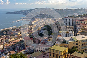 Naples hills on sunset with Mediterranean sea bay top view. Naples seashore. Neapol evening panorama.