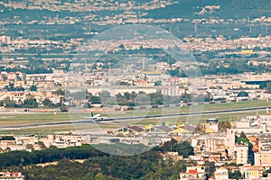 Naples, Italy. Plane Is Landing Or Taking Off At Naples International Airport photo
