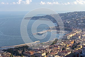 Naples and Mediterranean sea bay with boats top view. Naples seashore. Travel concept.