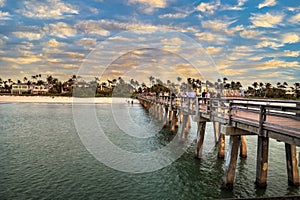 Naples Pier on the beach at sunset