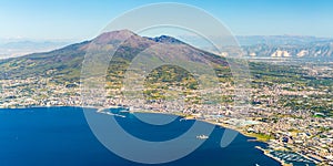 Napoli and mount Vesuvius in the background at sunrise in a summer day, Italy