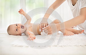 Nappy baby on changing mat