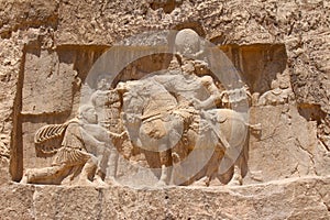 Naqsh-e Rustam, Iran. Rock relief of the triumph of Shapur I over the Roman emperors Valerian and Philip the Arab