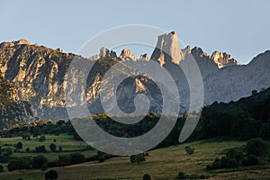 Naranjo de Bulnes, Picu Urriellu, from Pozo de la Oracion lookout point at sunset, Picos de Europa National Park in Astur photo