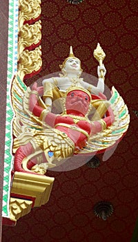 Narayana on Garuda stucco on temple post