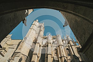 Narbonne old gothic cathedral landmark on a blue sunny sky