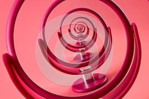 Narcissism and narcissistic personality disorder concept theme with a droste effect on a pink mirror creating a vortex