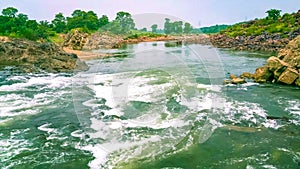 Narmada river flows through marble rocks close to Dhuadhar Falls in Bhedaghat, Jabalpur, Madhyapradesh, India
