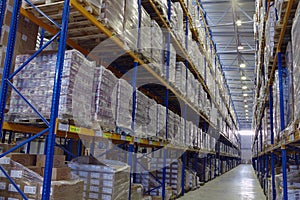 Narrow aisle warehouse with pallet storage system.