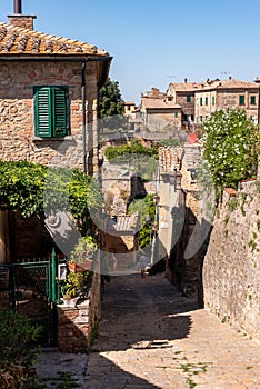 Narrow alley at the city wall of Volterra, Tuscany