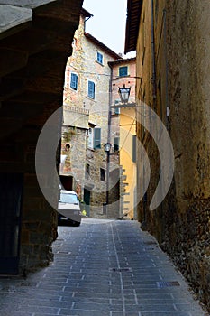 Narrow alley in italian old town