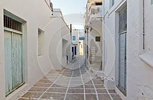 Narrow alley in Kimolos island, Cyclades, Greece photo