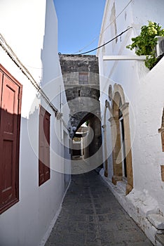 Narrow alley in Lindos town, Greece