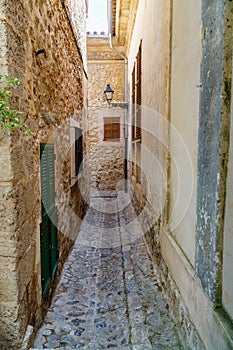 Narrow alley in mediterranean touristic spot Valldemossa, Majorca