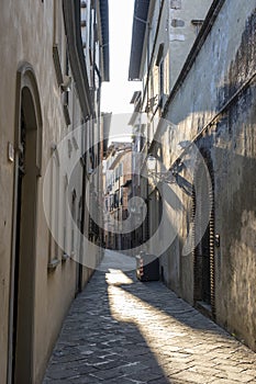 Narrow Alley With Old Buildings In Typical Italian Medieval Town