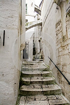 Narrow alley in Ostuni city photo