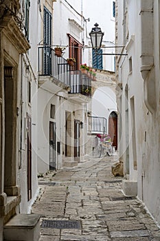 A narrow alley in Ostuni, Puglia, Italy