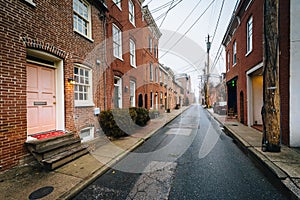 Narrow alley and row houses in Fells Point, Baltimore, Maryland