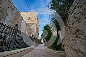 Narrow alleys with ancient Jerusalem stone houses,