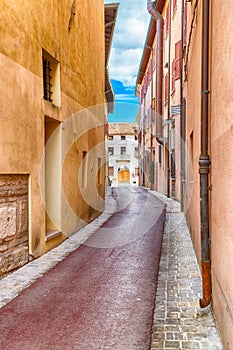 Narrow alleys between vertiginous walls of ancient buildings