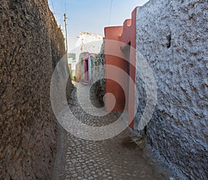 Narrow alleyway of ancient city of Jugol. Harar. Ethiopia. photo