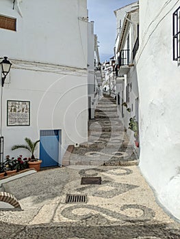 Narrow ally in small Andalusian town Frigiliana in Spain