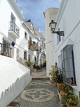 Narrow ally in small Andalusian town Frigiliana in Spain