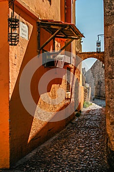 Narrow ancient cobblestone street in rodos greece