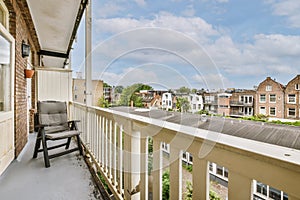 Narrow balcony with chair and door