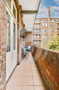 Narrow balcony with chair and door