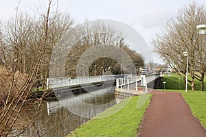 Narrow bike path over aqueduct de Waterdrager in NIeuwerkerk aan den IJssel