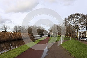 Narrow bike path over aqueduct de Waterdrager in NIeuwerkerk aan den IJssel