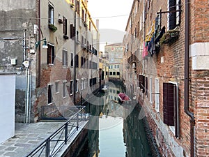 narrow canal in sestiere of Cannaregio in Venice photo