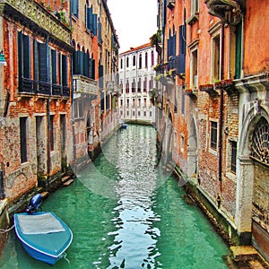 Narrow canal in Venice (Italy)