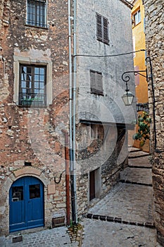 Narrow cobbled street in the old village France.