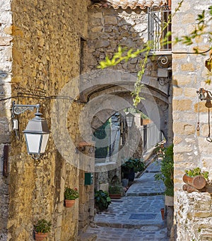 Narrow cobbled streets in the old village , France